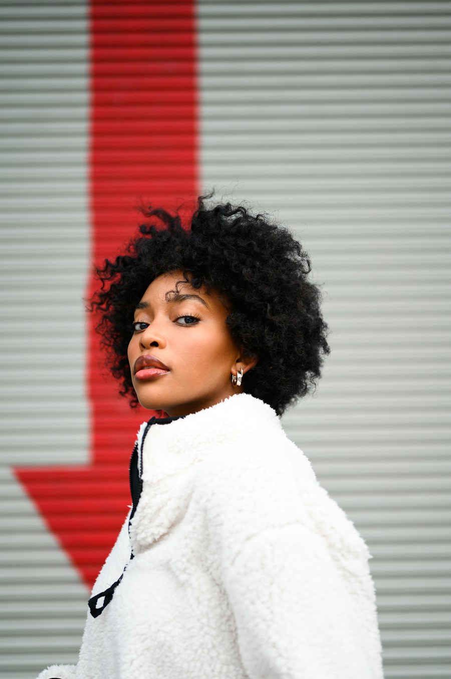 Short curls hairstyle inspiration; not an actual photograph of this sample wig